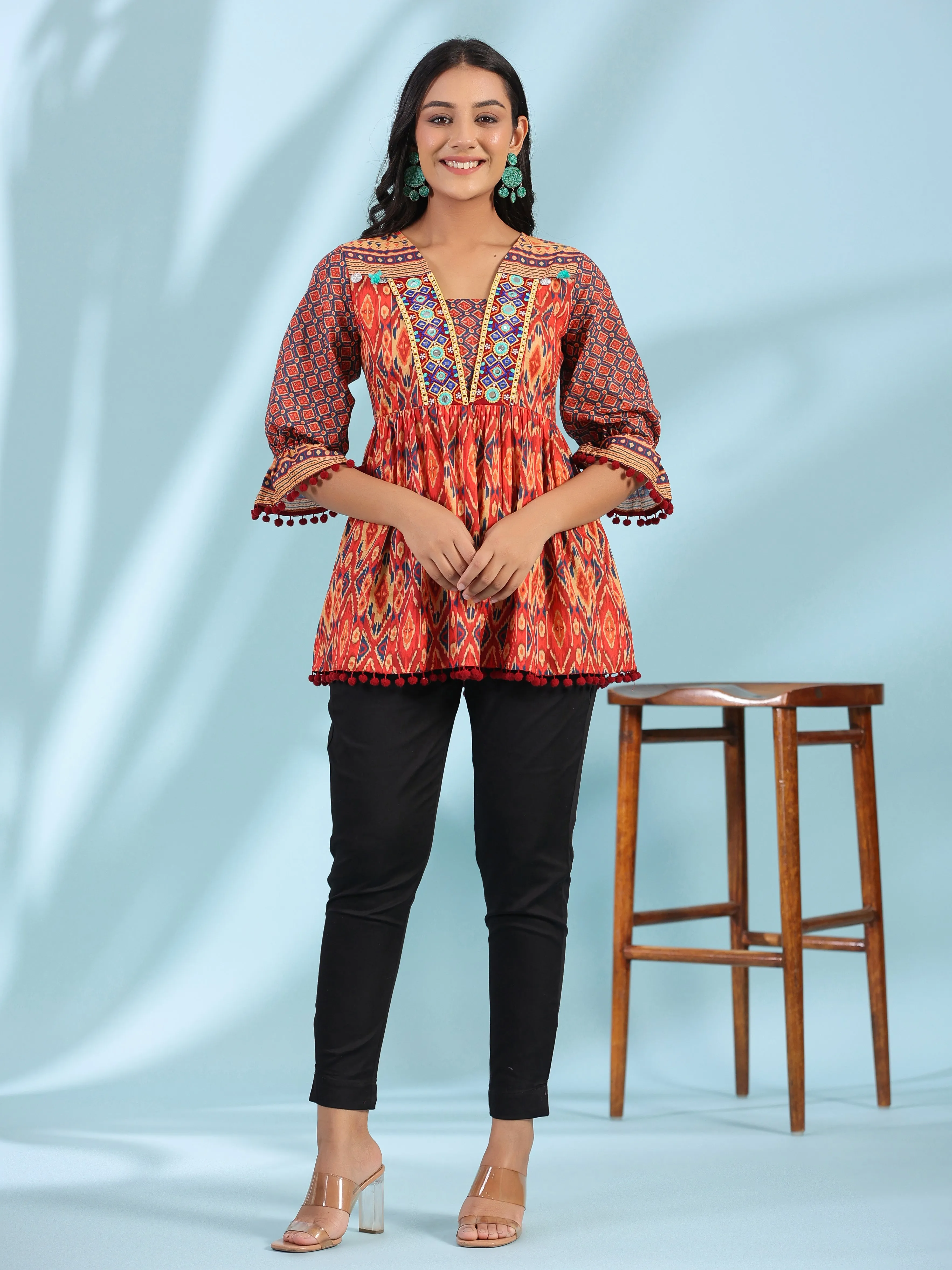 Juniper Orange Ikat Printed Peplum Cotton Tunic With Mirror Work & Lace