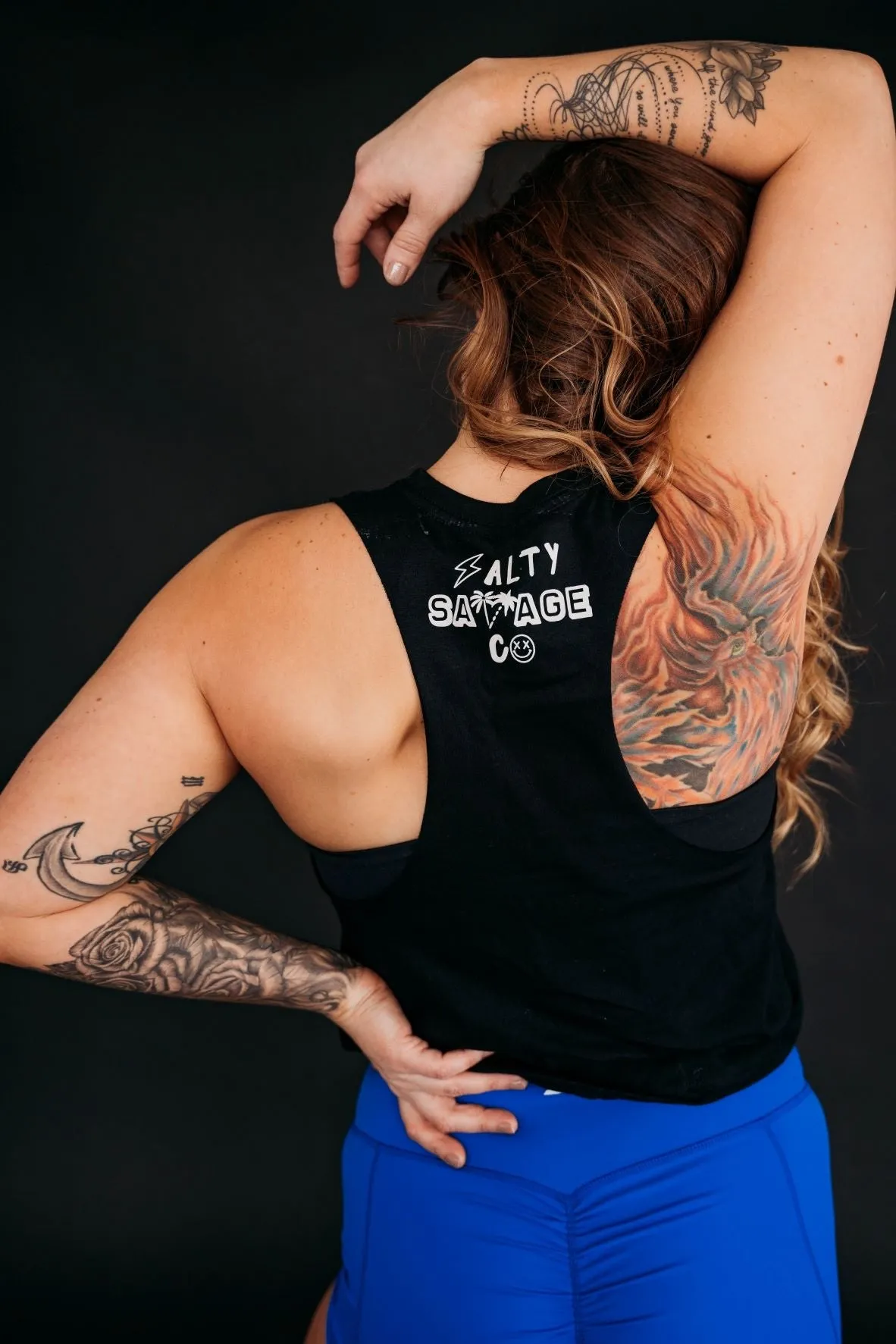 Salty Savage Ladies "MAKE MUSCLES, NOT EXCUSES" Flowy Racerback Crop Tank