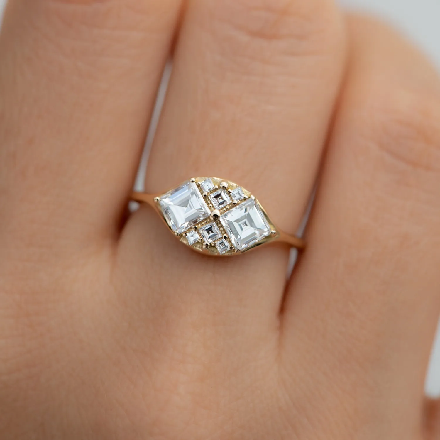 Step Cut Engagement Ring with Eight Square Diamonds