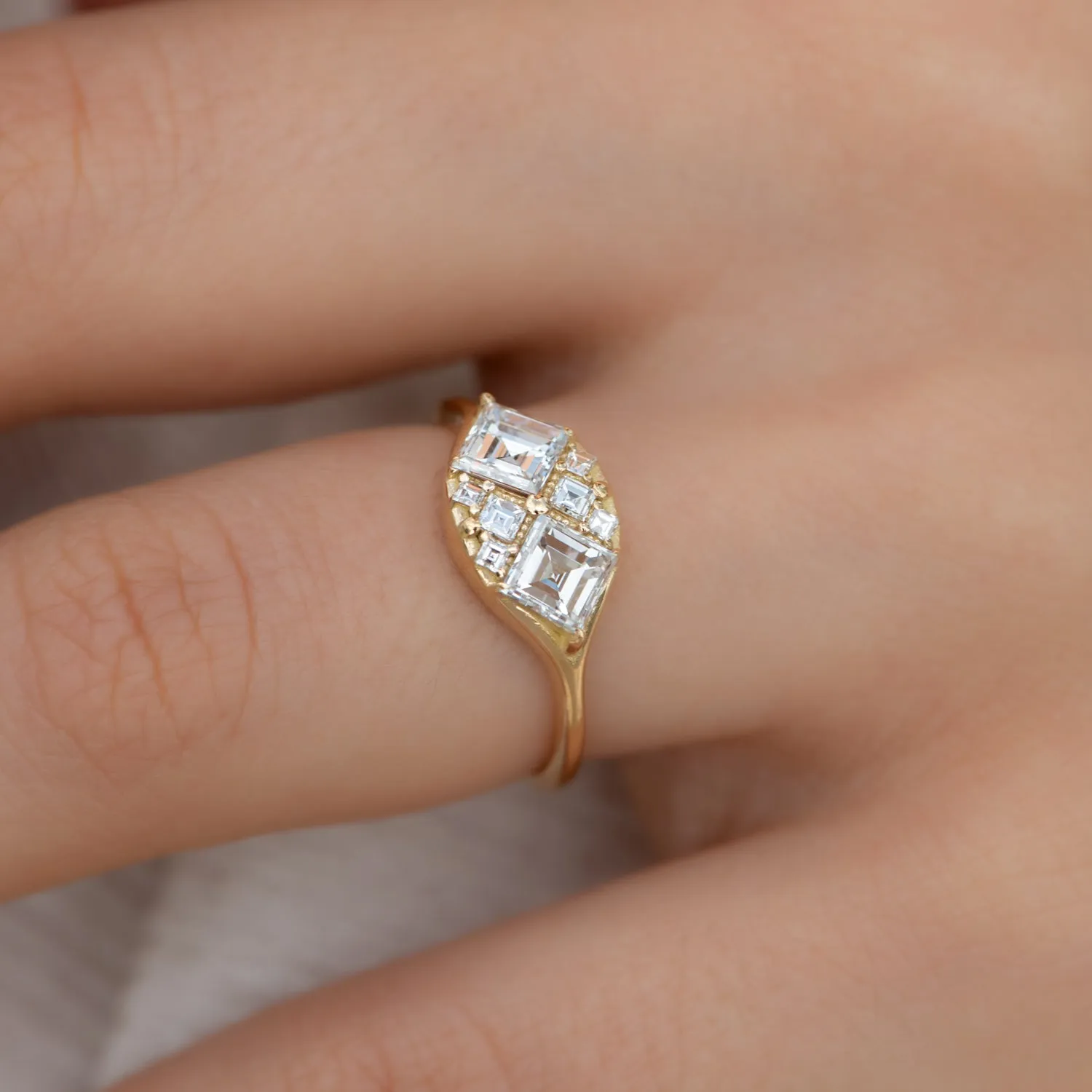 Step Cut Engagement Ring with Eight Square Diamonds